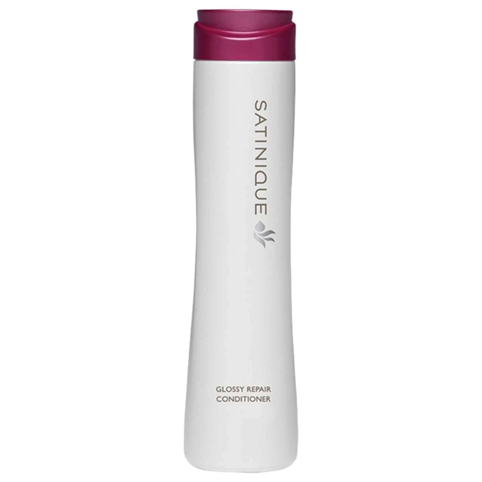 Pomegranate-scented Amway Satinique conditioner bottle for all hair types