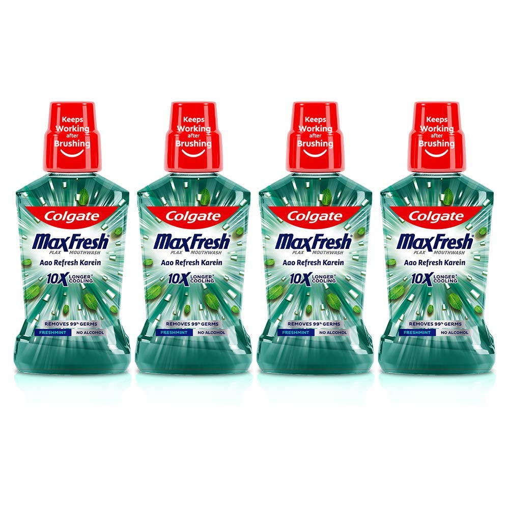 Four bottles of Colgate Plax Fresh Mint antibacterial mouthwash