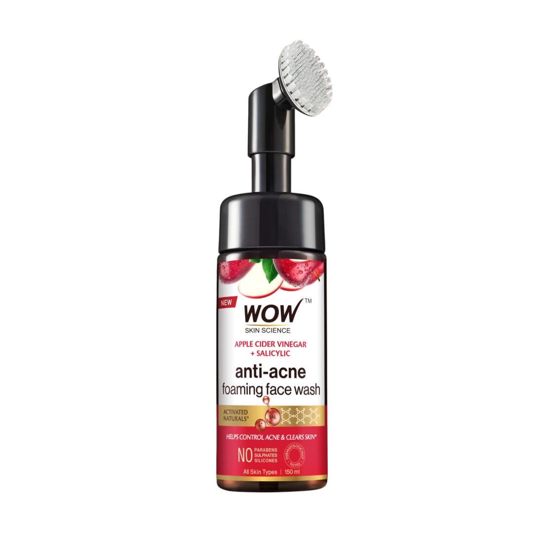 Apple cider vinegar foaming face wash bottle with attached cleansing brush