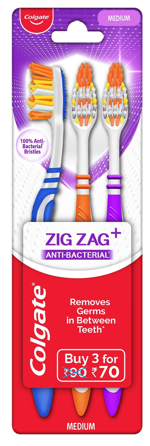 Three Colgate Zigzag medium manual toothbrushes in black blister pack
