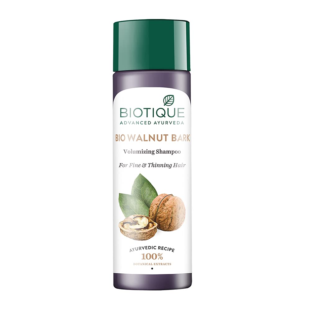 Front view of Biotique walnut volumizing shampoo bottle, 120 ml