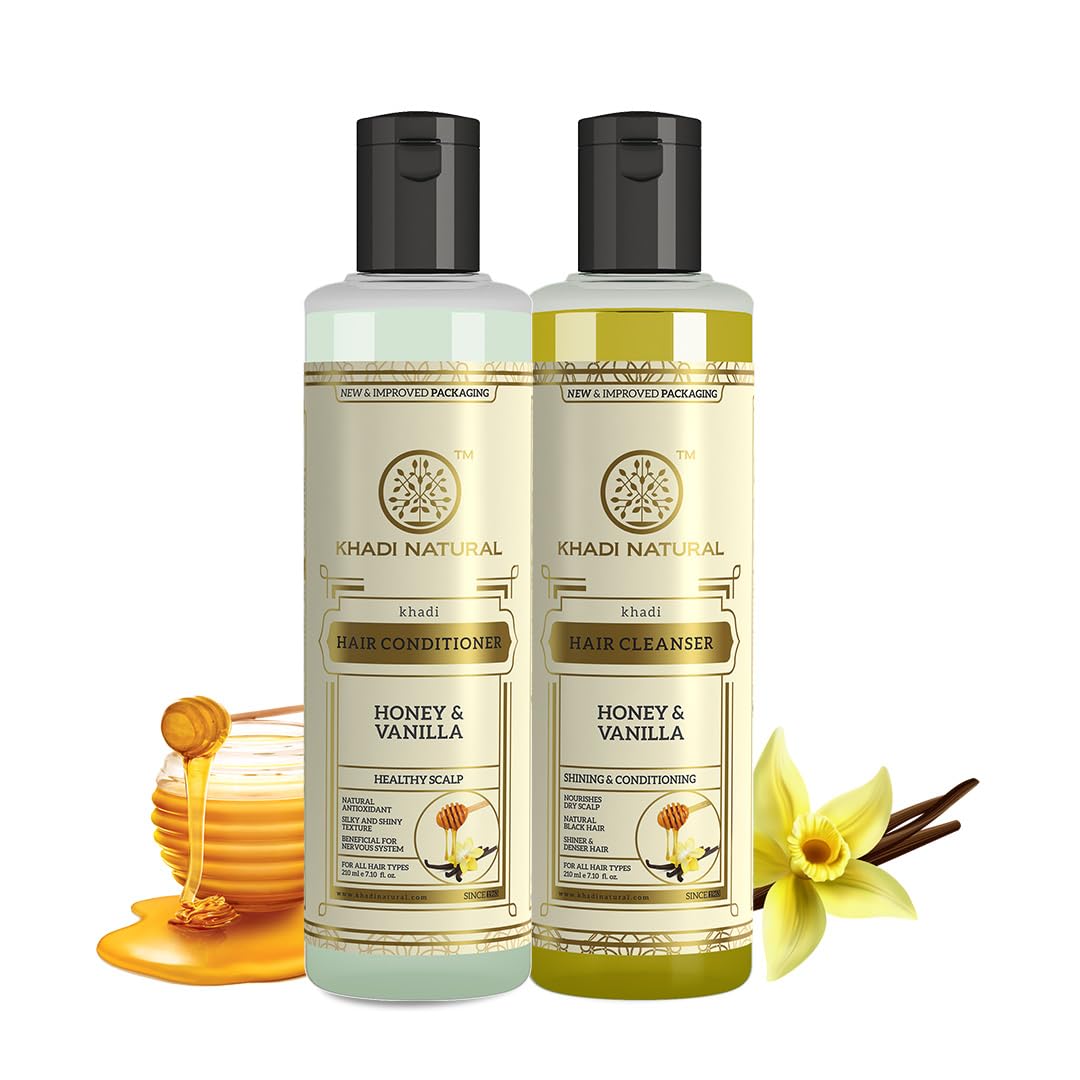 Two Khadi Natural honey vanilla hair care bottles, cleanser and conditioner