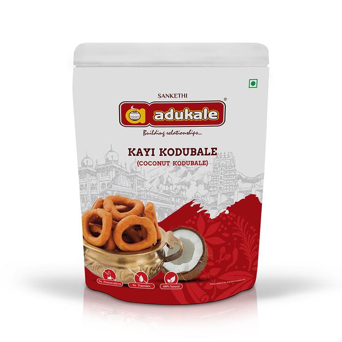 Adukale Kayi Kodubale coconut snack 180g pouch hero view