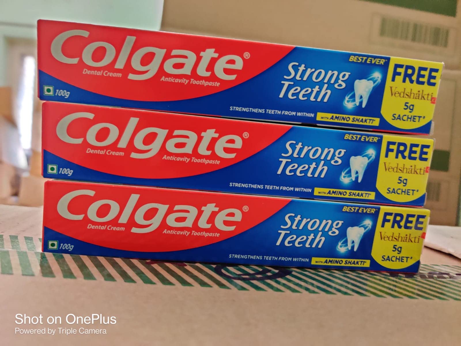 Three tubes of Colgate Strong Teeth fresh dental cream toothpaste