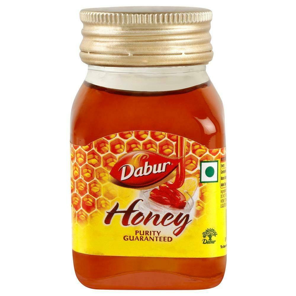Front view of Dabur Honey 50g bottle package