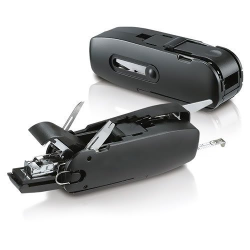 Black multi-functional office toolkit showing stapler, scissors, punch and ruler