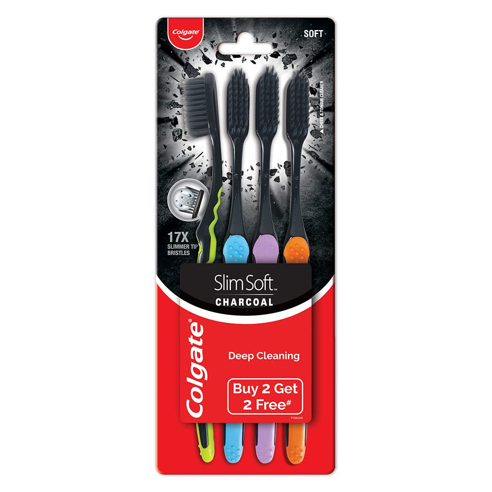 Four Colgate charcoal toothbrushes in assorted colors with slim soft bristles