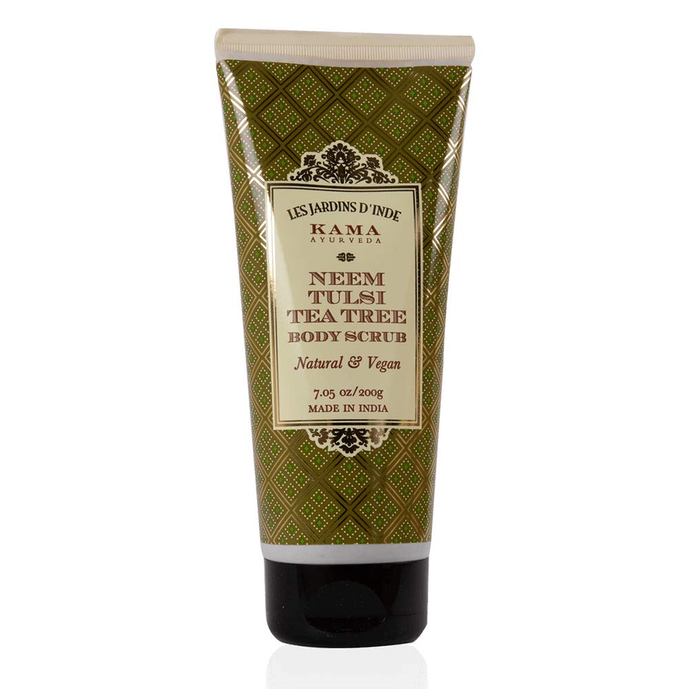 Green Kama Ayurveda body scrub jar with neem scent