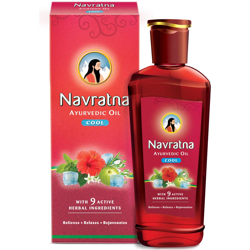 Navratna cooling hair oil bottle with Ayurvedic herbal oil formula