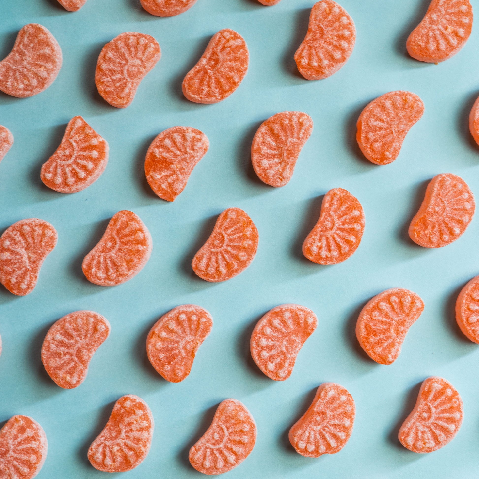 Orange digestive candy and mukhwas pack in reusable bottles