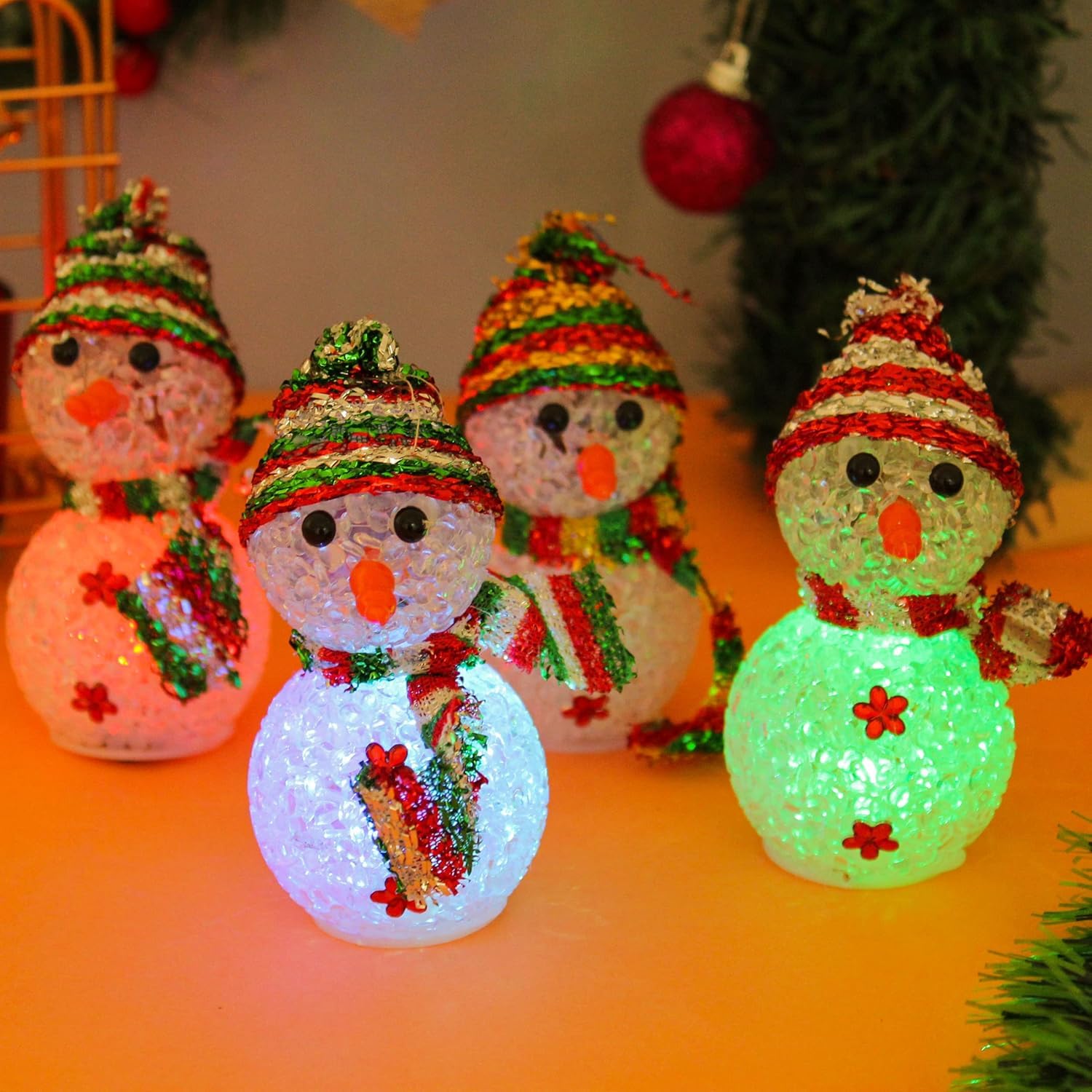 Four warm white LED snowman lights for Christmas home decor