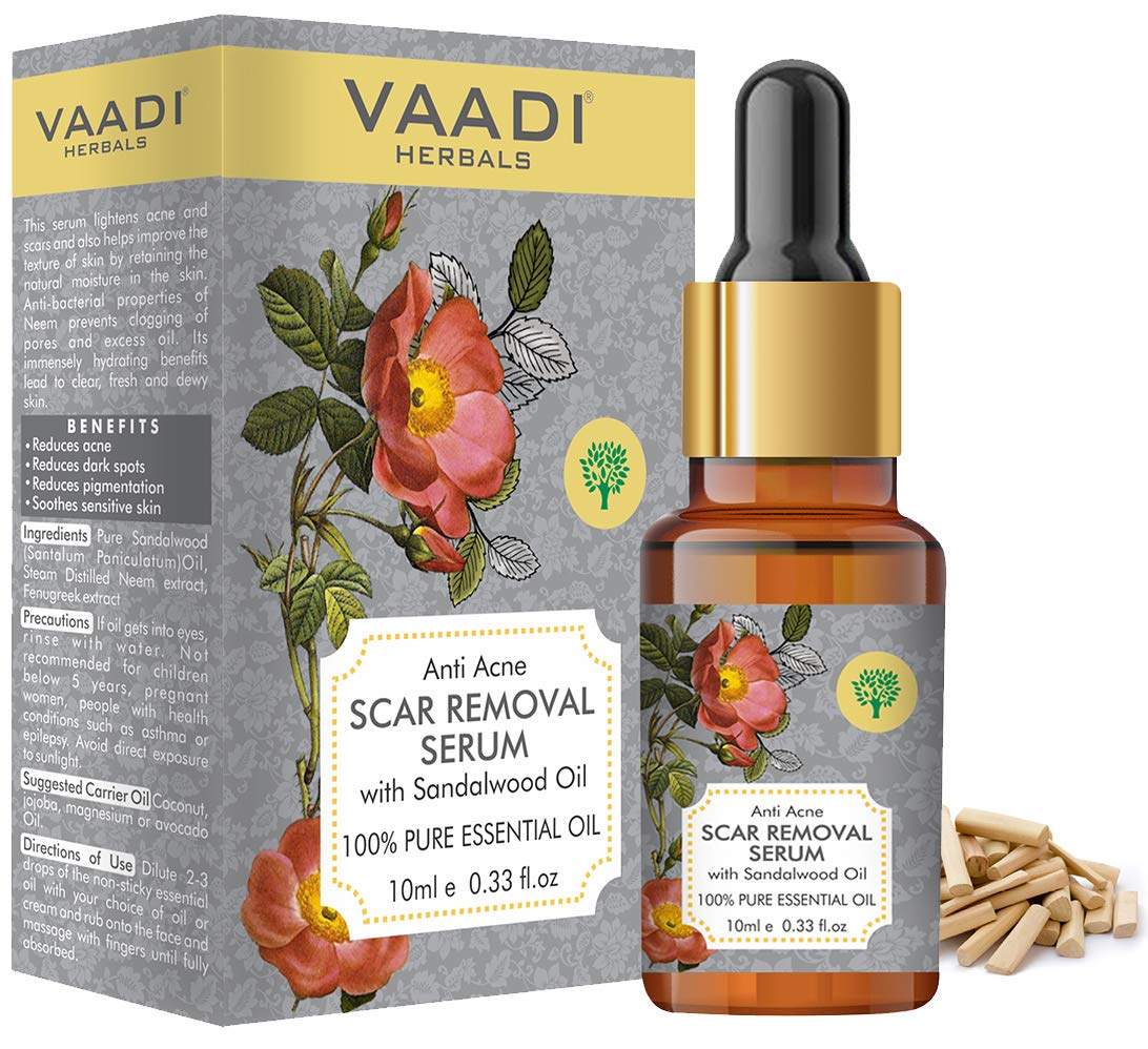 Scar removal face serum bottle with sandalwood neem blend