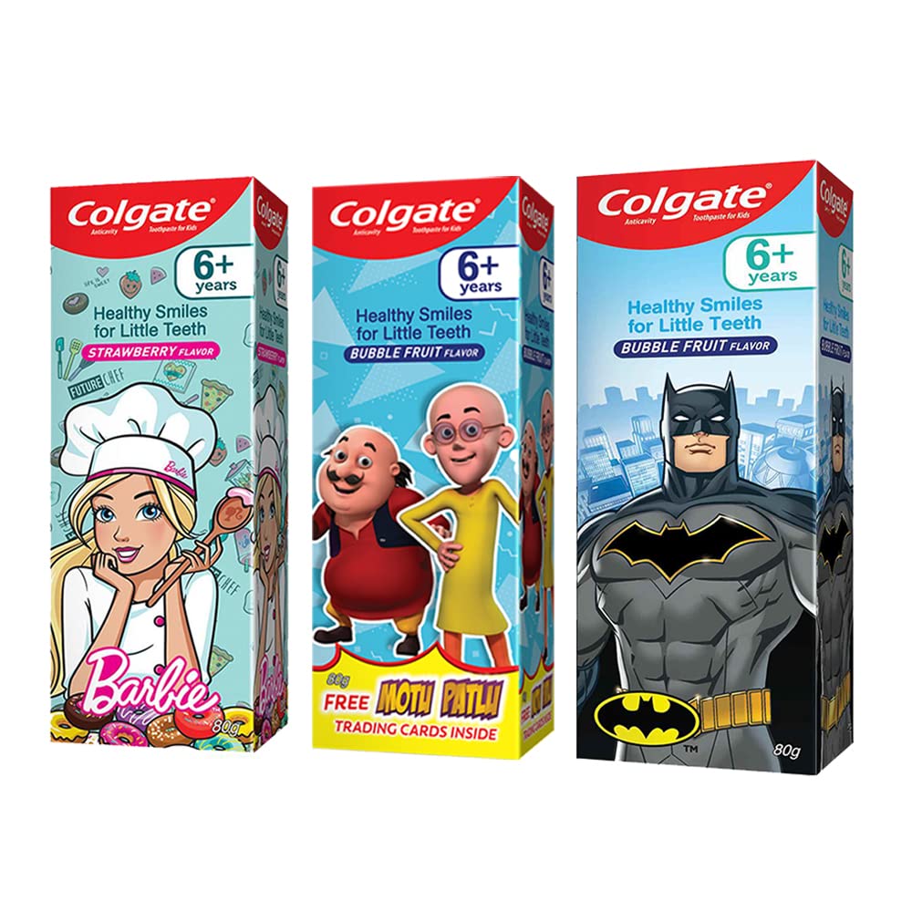 Three Colgate kids toothpaste tubes with Motu-Patlu Batman and Barbie designs